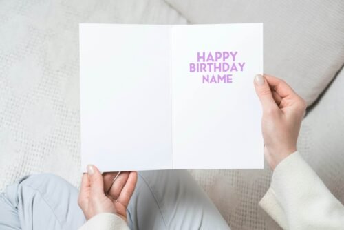 Personalised birthday card template with 'Happy Birthday' text and space for a name, ideal for custom celebrations.