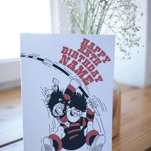 KA-POW! Personalise this Dennis & Gnasher Pole-vault Birthday card with names/ages for explosive Beano fun. Premium quality, ships fast – chaos guaranteed!