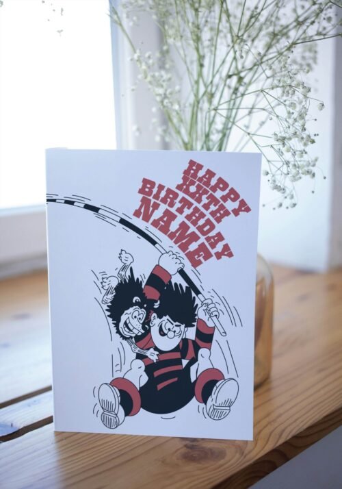 KA-POW! Personalise this Dennis & Gnasher Pole-vault Birthday card with names/ages for explosive Beano fun. Premium quality, ships fast – chaos guaranteed!