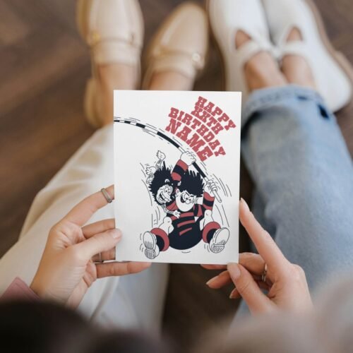 KA-POW! Personalise this Dennis & Gnasher Pole-vault Birthday card with names/ages for explosive Beano fun. Premium quality, ships fast – chaos guaranteed!