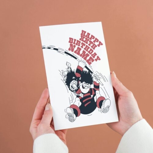 KA-POW! Personalise this Dennis & Gnasher Pole-vault Birthday card with names/ages for explosive Beano fun. Premium quality, ships fast – chaos guaranteed!