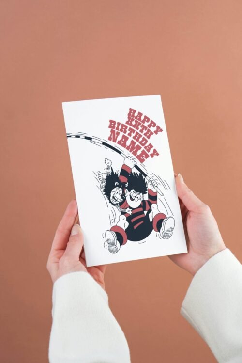 KA-POW! Personalise this Dennis & Gnasher Pole-vault Birthday card with names/ages for explosive Beano fun. Premium quality, ships fast – chaos guaranteed!