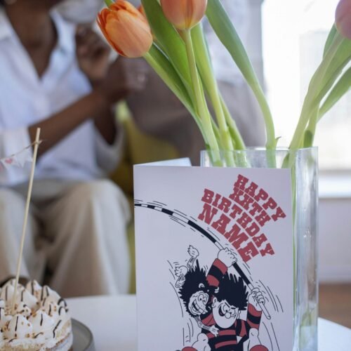 KA-POW! Personalise this Dennis & Gnasher Pole-vault Birthday card with names/ages for explosive Beano fun. Premium quality, ships fast – chaos guaranteed!