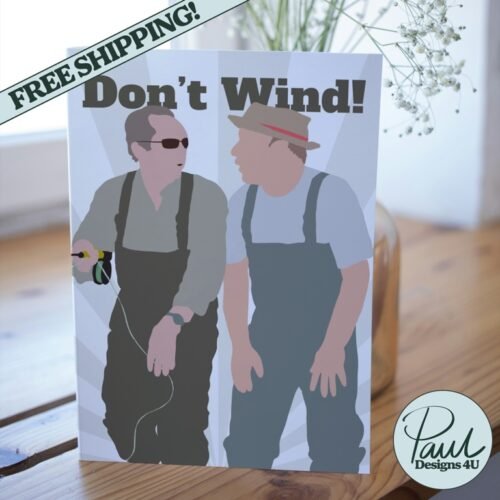 Gone Fishing Personalised Card displayed on a table, featuring a silhouette of Paul Whitehouse and Bob Mortimer by a riverside.