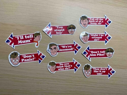 Dads Army Sticker Pack featuring iconic quotes like ‘Don’t Panic!’, ‘We’re Doomed!’, and ‘You stupid boy’, alongside beloved characters including Captain Mainwaring and Private Pike. A nostalgic tribute to the classic British comedy series.