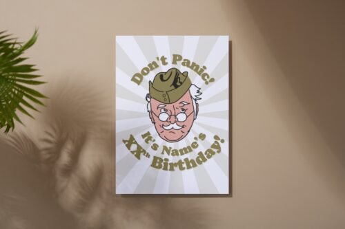 Overhead view of Corporal Jones birthday card on a rustic tabletop