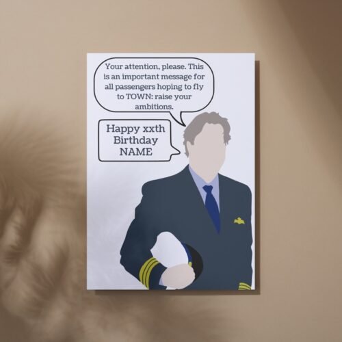 Overhead shot of the Douglas birthday card on a rustic surface, ideal for comedy fans