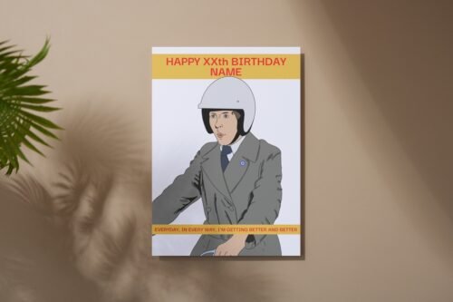 Frank Spencer birthday card lying flat on a wooden table, personalised with name and age
