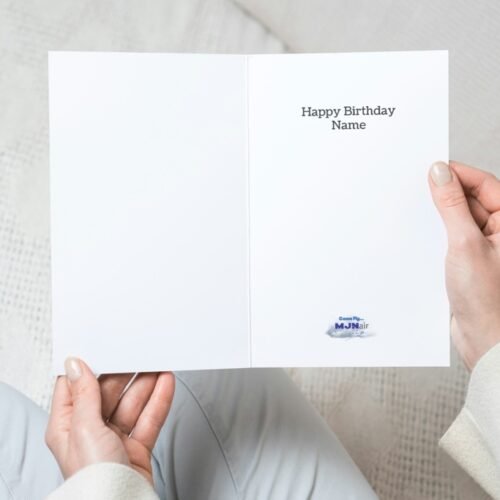 Close-up of hand holding the personalised Douglas card, showing custom name and age