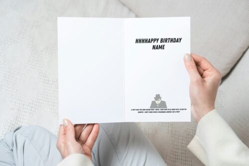 Person holding a Tony Hancock birthday card with retro design and personalised name