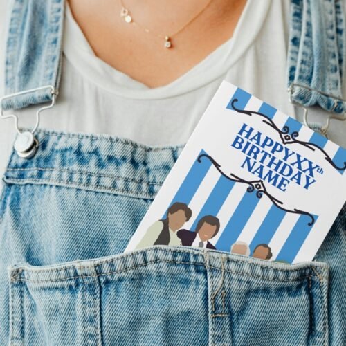 Funny greeting card peeking from a denim pocket in a playful display shot