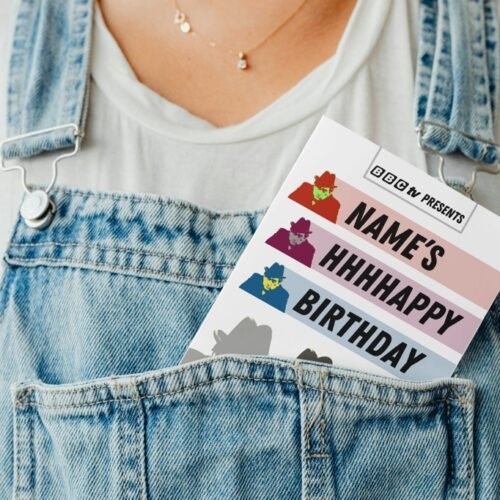 Tony Hancock birthday card peeking out of a denim dungaree pocket for a playful presentation