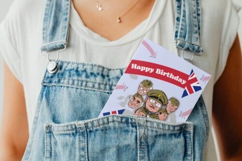 Funny greeting card peeking out of a denim pocket in a lighthearted product photo