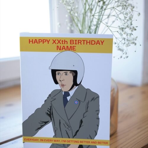 Overhead view of the hand-drawn Frank Spencer card on a rustic tabletop