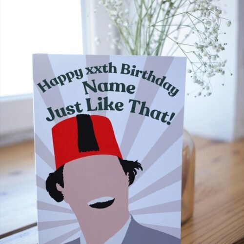 Retro British humour card resting on desk, perfect for fans of iconic one-liners