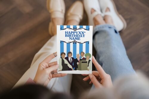 Person holding British sitcom birthday card featuring Mr Humphries and Mrs Slocombe