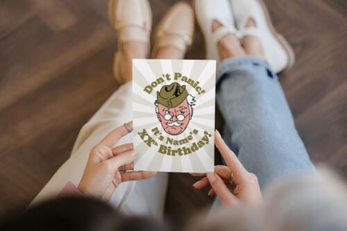 Don’t Panic birthday card held upright, displaying vibrant colours and premium cardstock