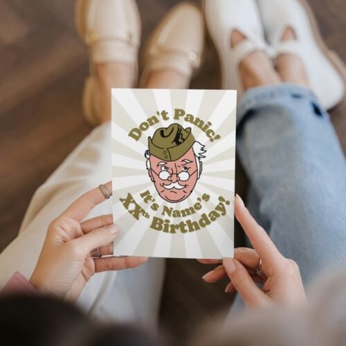 Don’t Panic birthday card held upright, displaying vibrant colours and premium cardstock