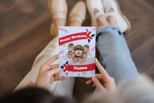 Card with Captain Mainwaring and Sergeant Wilson illustration, held upright on premium cardstock