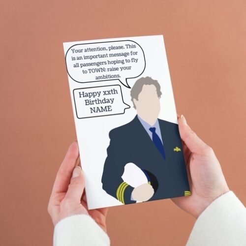 Person holding a Cabin Pressure birthday card featuring Douglas from the BBC Radio 4 sitcom