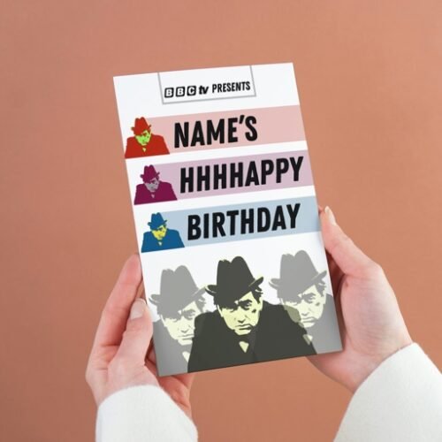 Close-up of the Hancock’s Half Hour card in hand, showing bold artwork and high-quality print