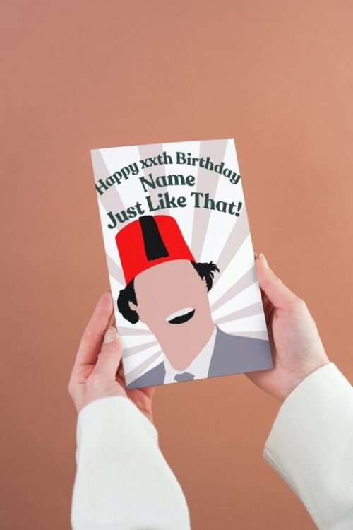 Person holding a Tommy Cooper birthday card with “Just like that!” quote and personalised name