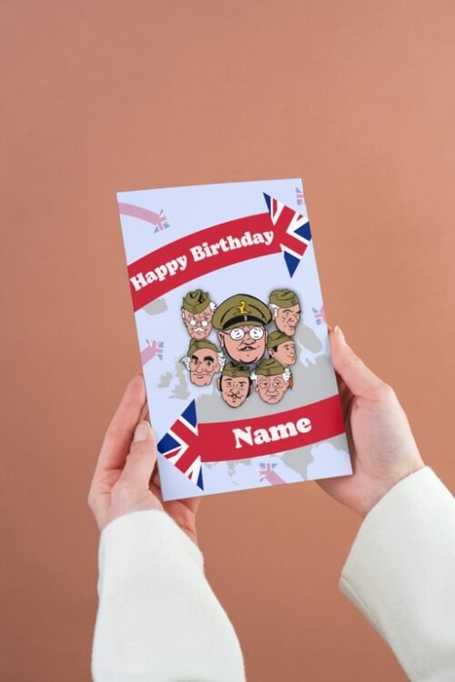 Person holding a Dads Army birthday card with cartoon Home Guard characters