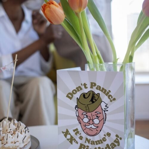 Printed birthday card on table highlighting personalised details and smooth finish
