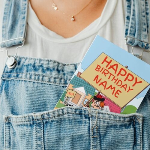 Minnie the Minx comic birthday card peeking from a denim pocket in playful display