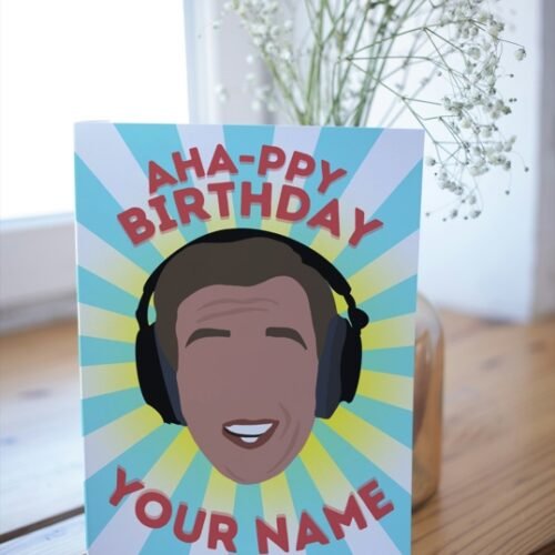 Partridge birthday card with custom name and inside message displayed on wooden surface