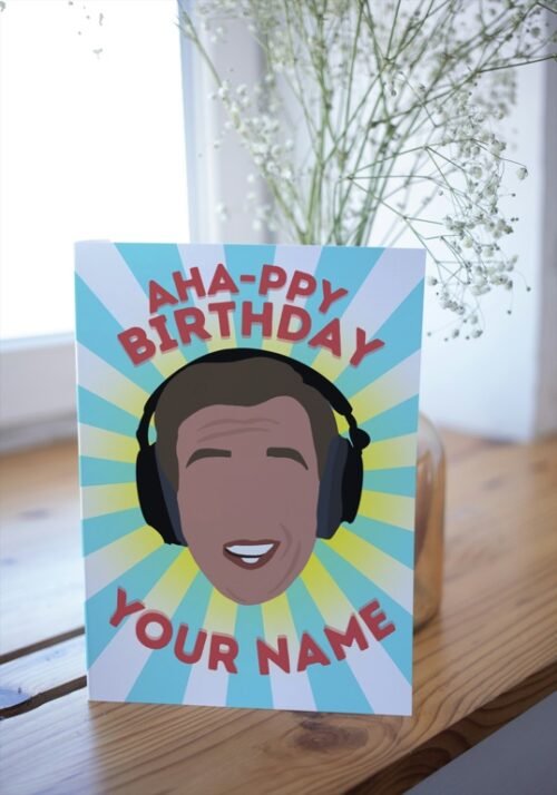 Partridge birthday card with custom name and inside message displayed on wooden surface