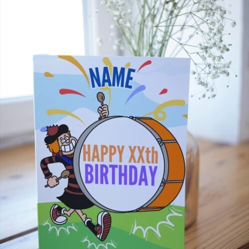 Minnie the Minx birthday card displayed on wooden surface, showing name and age