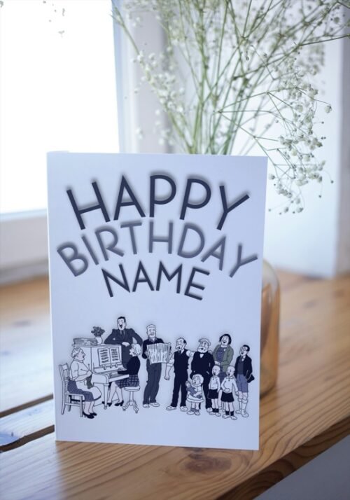 Open card on table with visible personalised inside text: “To [Name], Happy Birthday!”