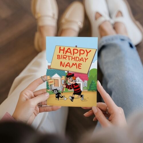 Comic birthday card featuring Minnie and her cat holding birthday signs