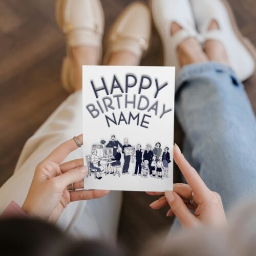 Hand holding personalised The Broons birthday card showing the full front design with family illustration and “Happy Birthday [Name]” text.