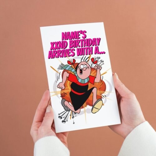 Funny comic card with retro Beano-inspired design held in hand