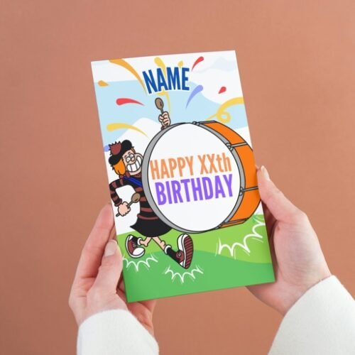 Comic-style personalised card featuring Minnie banging a birthday drum, shown in hand