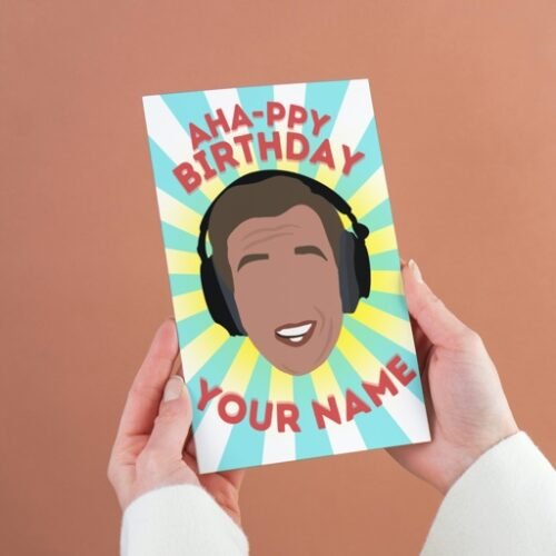 Alan Partridge personalised named birthday card with A-Ha-ppy Birthday text, shown in hand