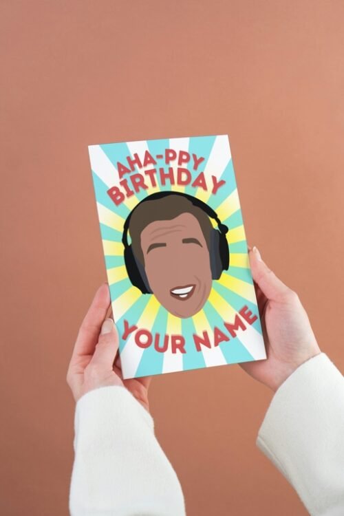 Alan Partridge personalised named birthday card with A-Ha-ppy Birthday text, shown in hand