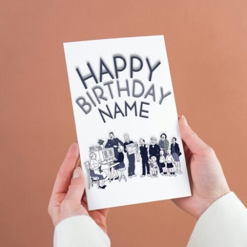 Hand holding personalised The Broons birthday card showing the full front design with family illustration and “Happy Birthday [Name]” text.