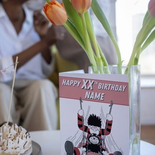 Beano-inspired card featuring Dennis and Gnasher, ready to personalise