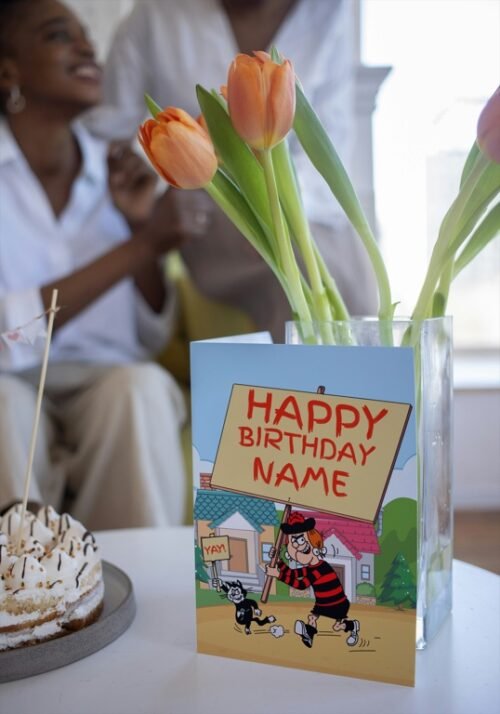 Comic birthday card featuring Minnie and her cat holding birthday signs